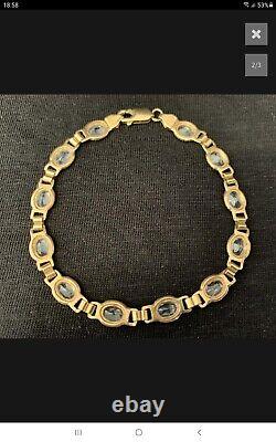 9ct Yellow solid Gold Ladies Blue Topaz Bracelet highly decorative 7 1/2
