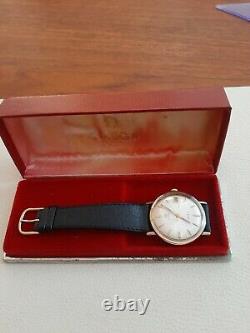 9ct gold Omega Geneve mens watch in good vintage condition and original box