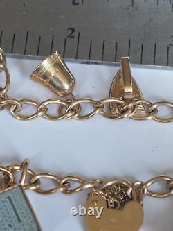 9ct gold charm bracelet +9 charms all hallmarked 21.16 grams