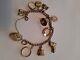 9ct Gold Charm Bracelet With 10 9ct Gold Charms Used