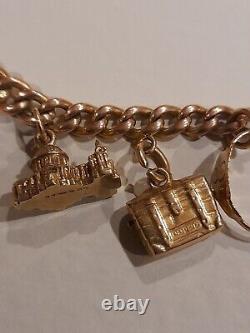 9ct gold charm bracelet with 10 9ct gold charms used