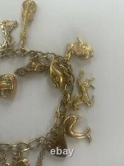 9ct gold charm bracelet with 13 charms And 20grams New