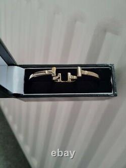 9ct gold designer T bangle? Special offer