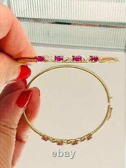 9ct gold diamond & ruby crossover hinged bangle 6 cm wide 4.6 g hallmark