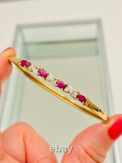 9ct gold diamond & ruby crossover hinged bangle 6 cm wide 4.6 g hallmark