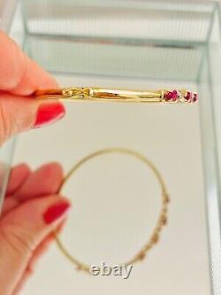 9ct gold diamond & ruby crossover hinged bangle 6 cm wide 4.6 g hallmark