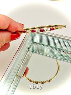 9ct gold diamond & ruby crossover hinged bangle 6 cm wide 4.6 g hallmark