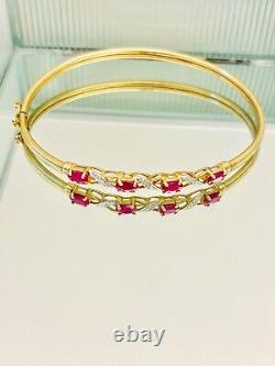 9ct gold diamond & ruby crossover hinged bangle 6 cm wide 4.6 g hallmark