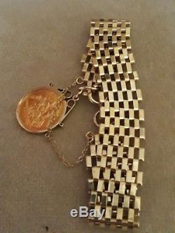 9ct gold gate bracelet with full sovereign