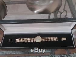 9ct gold ladies quartz watch with an impressive bracelet in excellent condition