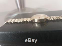 9ct gold ladies quartz watch with an impressive bracelet in excellent condition