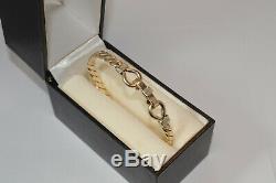 9ct gold torque bangle bracelet 30.5 grams / hook & loop bracelet / 375 gold