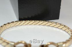 9ct gold torque bangle bracelet 30.5 grams / hook & loop bracelet / 375 gold