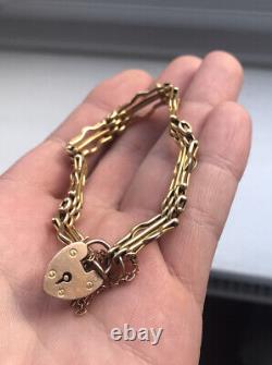 9ct padlock and yellow gold gate bracelet