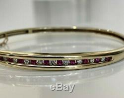 9ct solid gold with Diamond & Ruby bangle 12.50g
