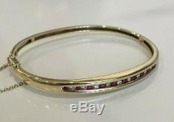 9ct solid gold with Diamond & Ruby bangle 12.50g