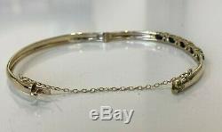 9ct solid gold with Sapphire & white stone bangle 8.30g