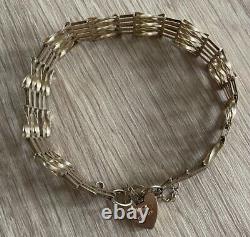 9ct yellow gold 5 bar twisted gate bracelet with padlock 5g 6.5