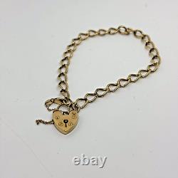 9ct yellow gold charm bracelet with love heart locket and safety chain 7.5 inch