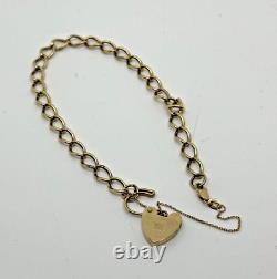 9ct yellow gold charm bracelet with love heart locket and safety chain 7.5 inch