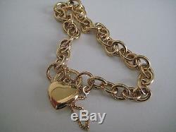 9ct yellow gold classic charm bracelet with heart padlock