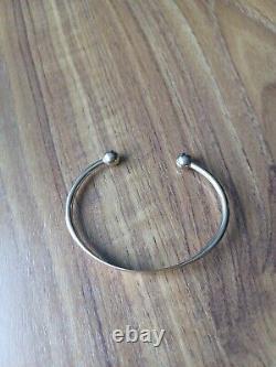 9ct yellow gold torque bangle used