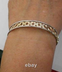 9ct yellowithwhite bangle with s/catch