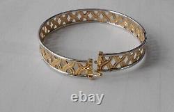 9ct yellowithwhite bangle with s/catch