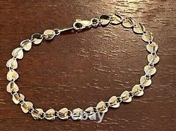 A Beautiful 9ct Gold Heart Bracelet
