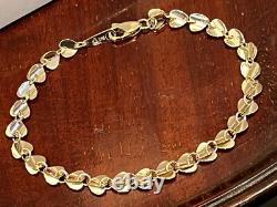 A Beautiful 9ct Gold Heart Bracelet