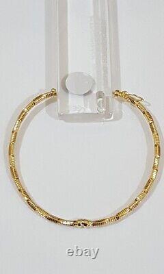 Beautiful 9ct Gold 62x50mm Hinged Bangle with locking clasp and aligning tongue