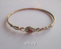 Beautiful 9ct yellow & white gold Bangle with Garnet diamond accents 9K 375