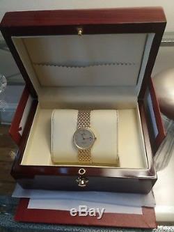 Brand new 9ct gold men's watch with 9ct gold wide bracelet