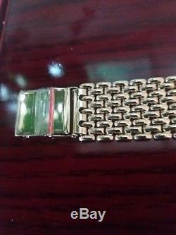 Brand new 9ct gold men's watch with 9ct gold wide bracelet