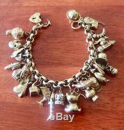 Charm Bracelet 9 ct Gold 73.4 gram 25 Charms Mainly 9ct 14ct 18ct 20.5cm