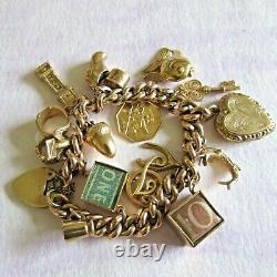 FABULOUS 9ct GOLD FULLY HALLMARKED CHARM BRACELET WEIGHS A HEAVY 38.9g