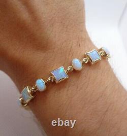 Fine Opal Bracelet 375 (9ct) Yellow Gold Length 7 1/2in (19cm) 11.7 grams