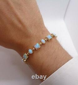 Fine Opal Bracelet 375 (9ct) Yellow Gold Length 7 1/2in (19cm) 11.7 grams