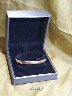 From The Italian AtelierHouse Of Frederico, 9ct gold bangle, Gold with Memory