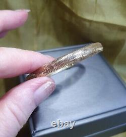 From The Italian AtelierHouse Of Frederico, 9ct gold bangle, Gold with Memory