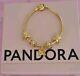 Genuine Pandora Gold Signature Bracelet & 5 Gold Pandora Charms 19 Cm Ale Met