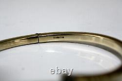 Hallmarked 9ct Gold Sprung Hinged Crossover Bangle With Clear Stones