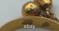 Hallmarked 9ct gold bracelet & seven charms. Weight approx. 32.5g