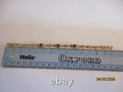 Ladies 9ct Gold Garnet link chain Bracelet 3.4g 18cm 7 marked 375