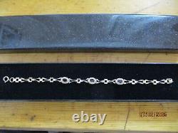 Ladies 9ct Gold Garnet link chain Bracelet 3.4g 18cm 7 marked 375