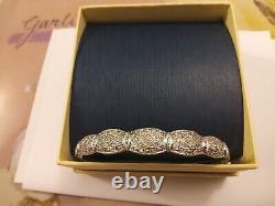 Ladies 9ct white gold hinged bangle/ bracelet with tiny chip diamonds pre owned