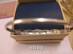 Ladies 9ct white gold hinged bangle/ bracelet with tiny chip diamonds pre owned