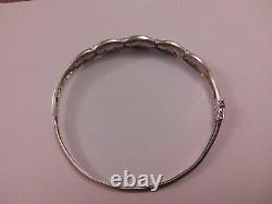 Ladies 9ct white gold hinged bangle/ bracelet with tiny chip diamonds pre owned