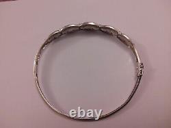 Ladies 9ct white gold hinged bangle/ bracelet with tiny chip diamonds pre owned