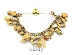Ladies/womens 9ct gold vintage charm bracelet with 15 charms + padlock fastening